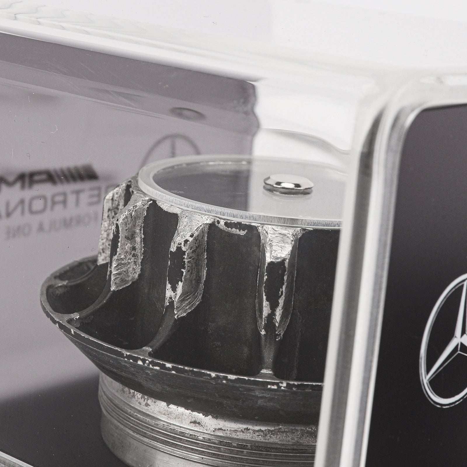 Mercedes AMG Petronas 2011 Grand Prix Used Wheel Nut in Display Case