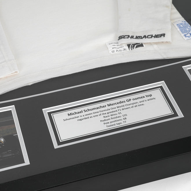 Season Launch LOT 027 - Michael Schumacher 2010 Mercedes Nomex - Framed