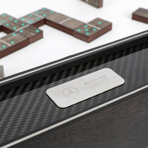 Mercedes-AMG F1® Team dominoes set created from authentic Formula 1 Grand Prix-used skid plank, premium motorsport memorabilia for collectors