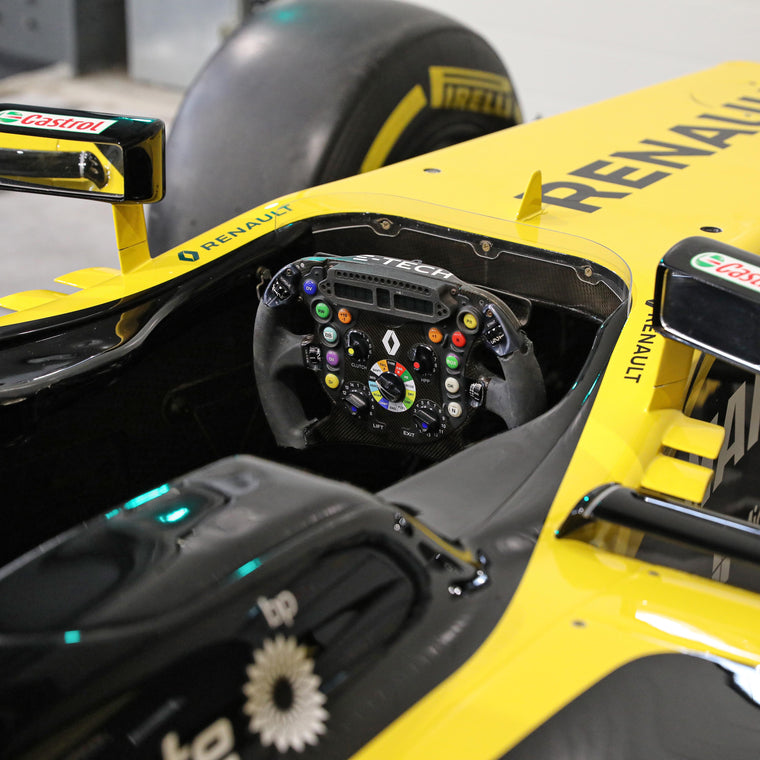 Lotus E22-03 2014 rolling chassis featuring bold 2019 RS19 graphics, premium Formula 1-inspired collector display