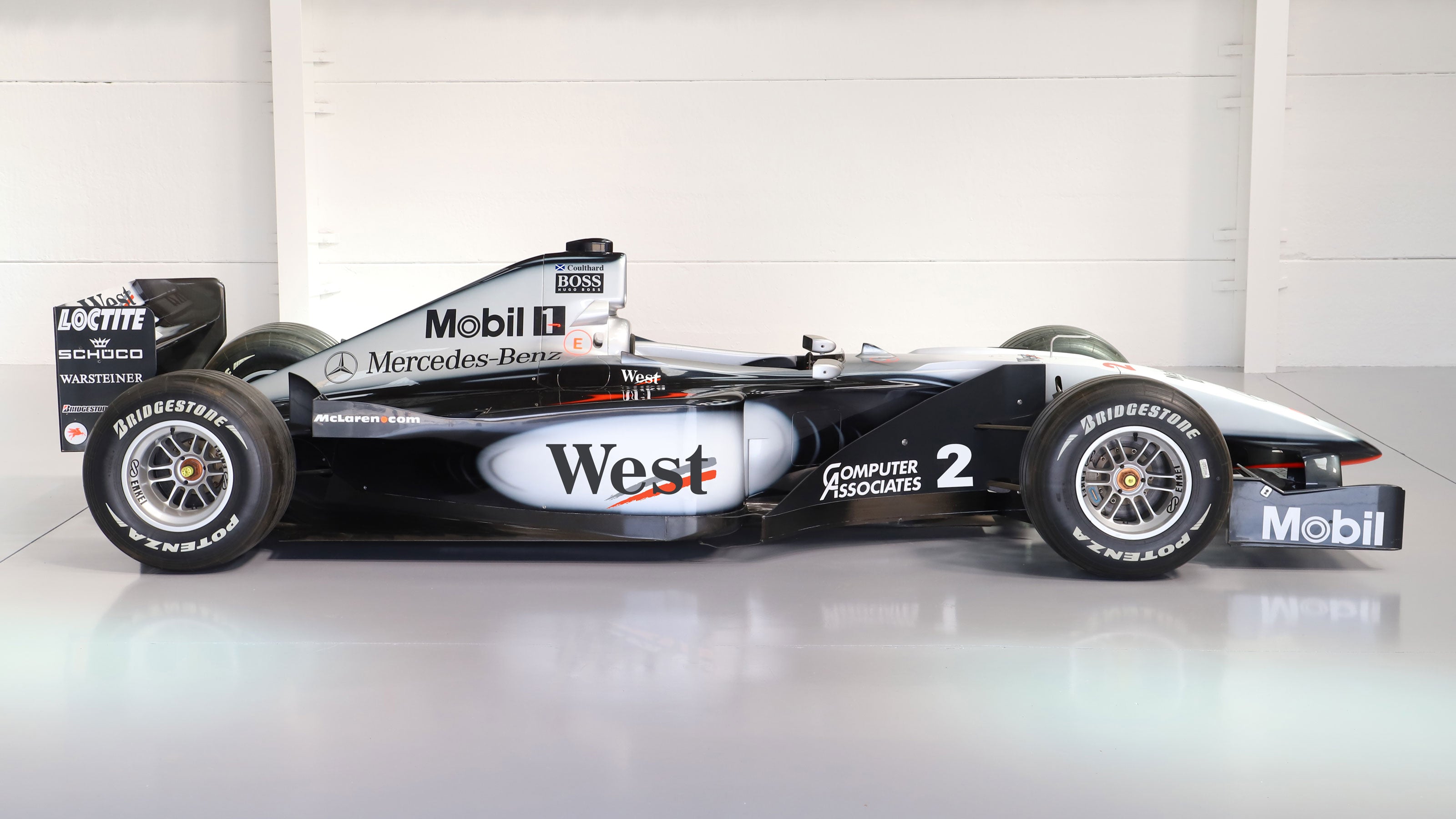 再再値下げ！McLaren MP4-14 1999 Mika Hakkinen Mika Hakkinen Driving his 1999 Mclaren MP4/14 @ Goodwood