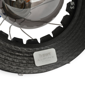Close-up of Alpine F1 carbon brake disc lamp illuminated