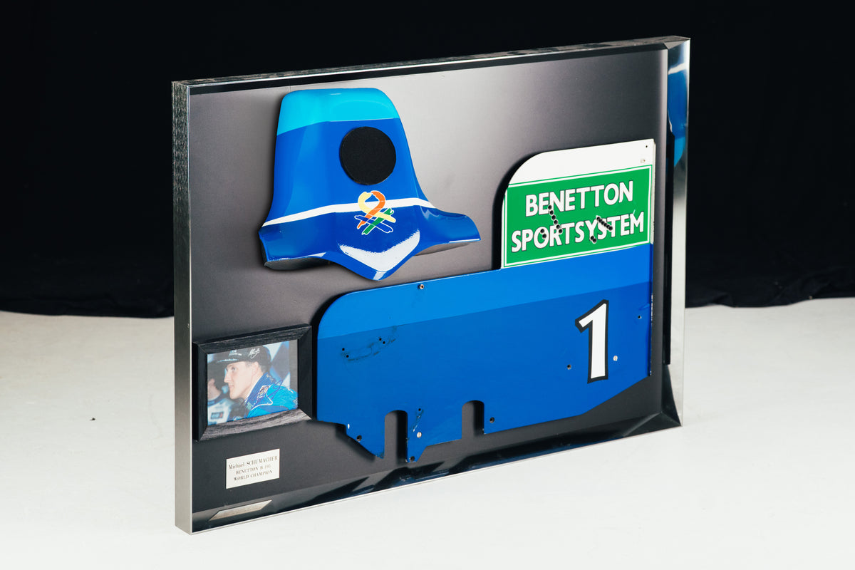 The Austin Auction LOT 024 - Michael Schumacher 1995 Benetton B195 Head Rest & Rear Wing Right-Hand Endplate –  Signed Framed