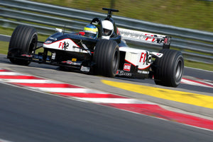 LOT 025 - Formula 1® Minardi 2-Seater Car Experience – Make-A-Wish