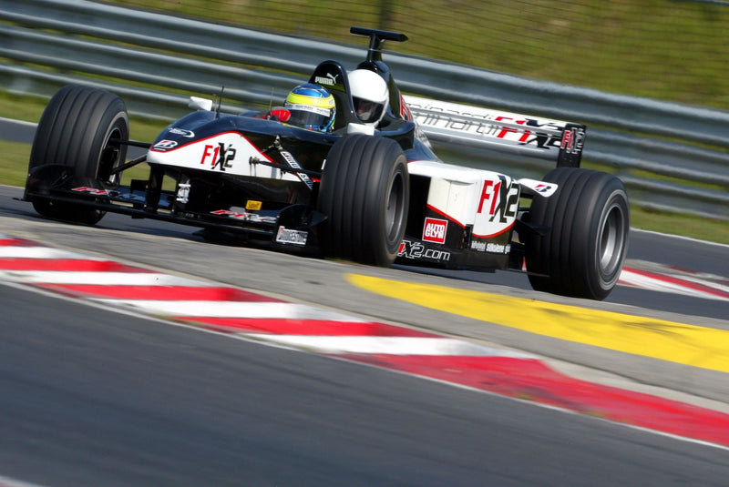LOT 025 - Formula 1® Minardi 2-Seater Car Experience – Make-A-Wish