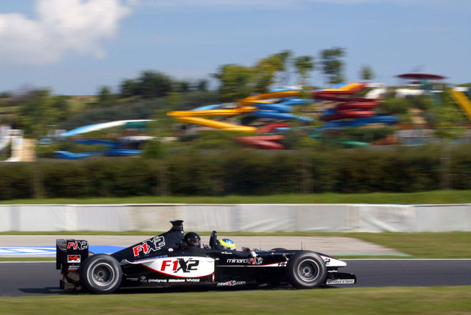 LOT 025 - Formula 1® Minardi 2-Seater Car Experience – Make-A-Wish