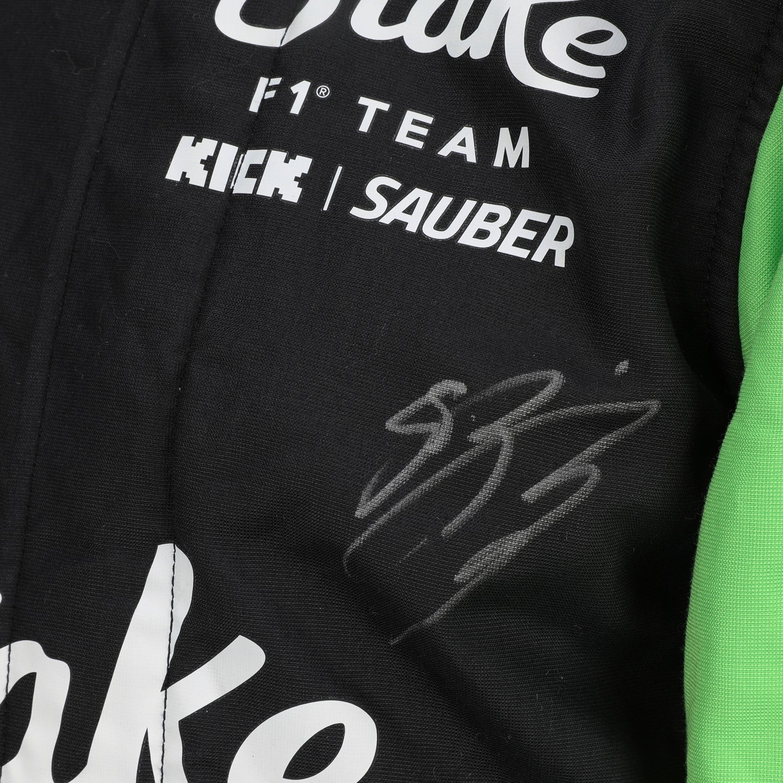 LOT 634 - Gabriel Bortoleto Signed 2025 Grand Prix Used Stake F1 Team Kick Sauber Race Suit