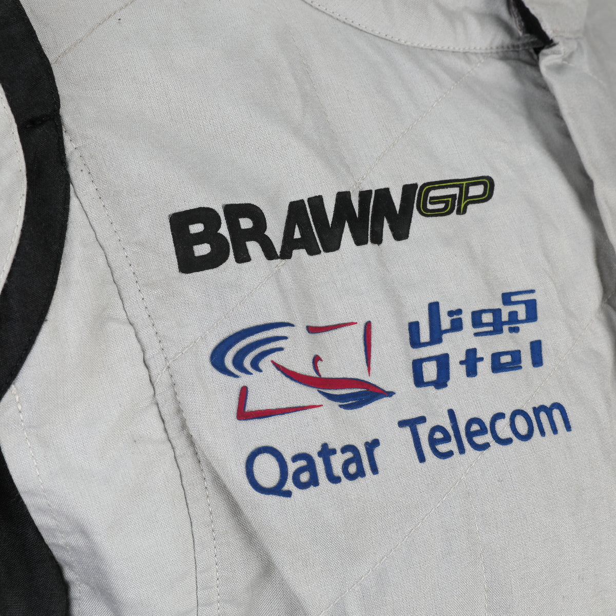 LOT 002 - Jenson Button 2009 Brawn GP Abu Dhabi Grand Prix Weekend-Used Race Suit