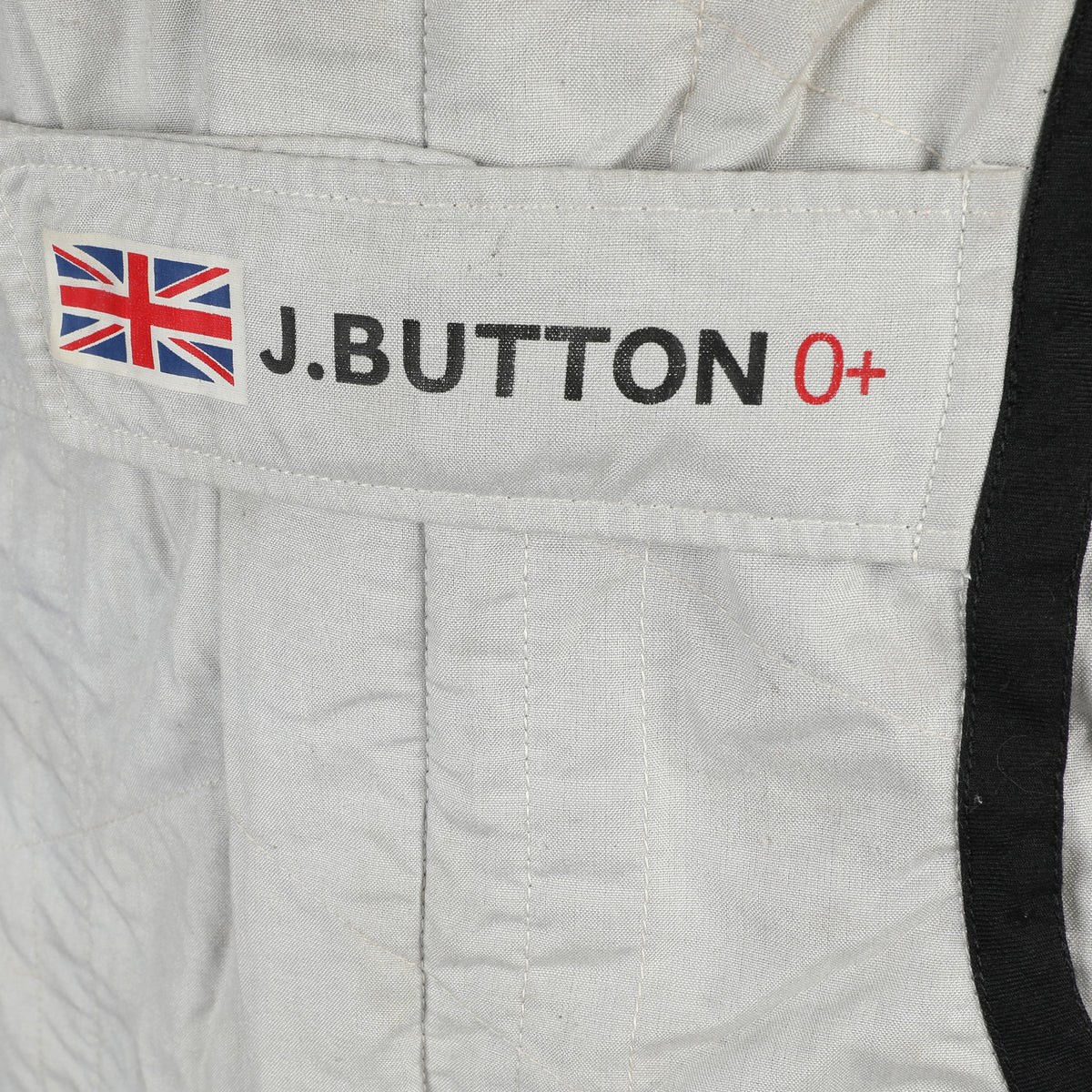 LOT 002 - Jenson Button 2009 Brawn GP Abu Dhabi Grand Prix Weekend-Used Race Suit