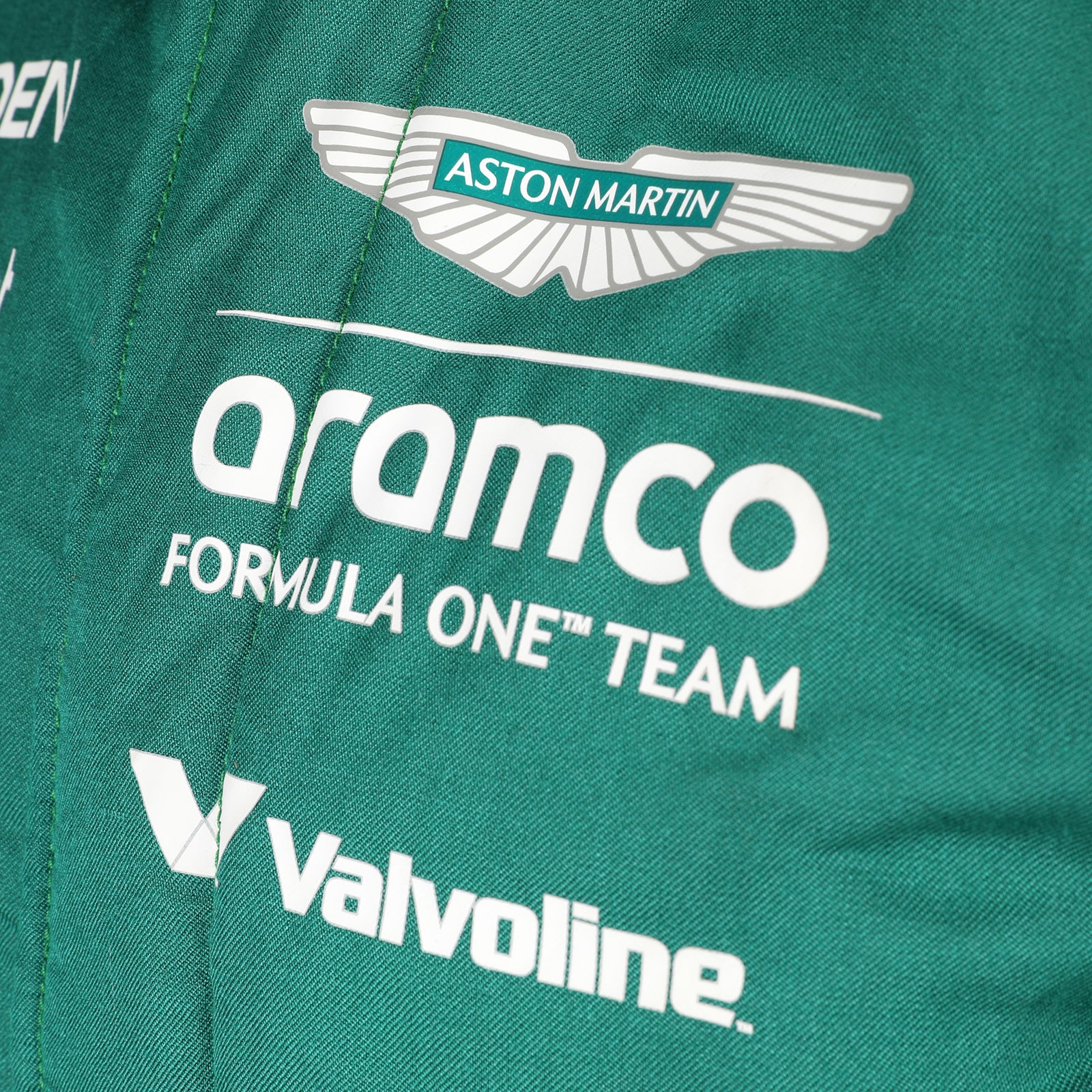 Auction LOT 028 - Lance Stroll 2025 Aston Martin F1 Team Suit