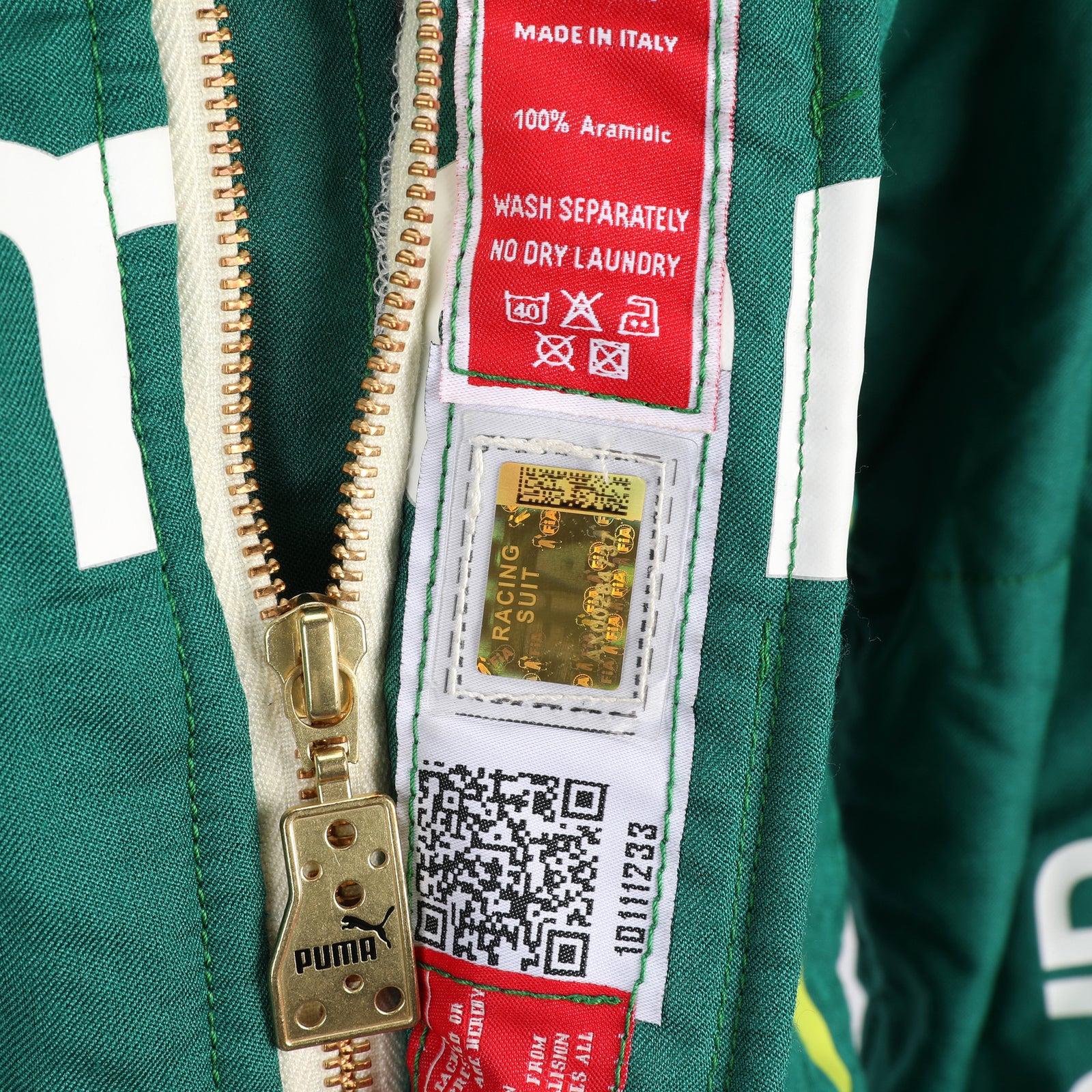 Auction LOT 028 - Lance Stroll 2025 Aston Martin F1 Team Suit
