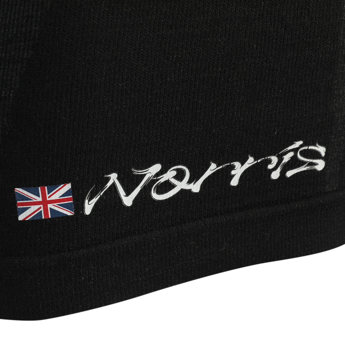 The Austin Auction LOT 018 - Lando Norris 2024 Japanese GP Race-Used Nomex – Signed by Lando Norris & Oscar Piastri