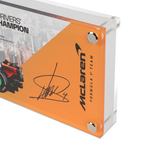 Lando Norris 2025 McLaren Championship Edition acrylic display featuring a genuine Grand Prix-used skid plank piece from Formula 1 competition