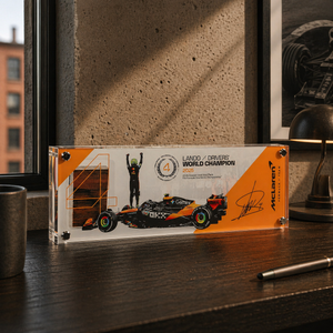 Lando Norris 2025 McLaren Championship Edition Grand Prix-used skid plank piece, genuine Formula 1 race-used bodywork in an acrylic collector display