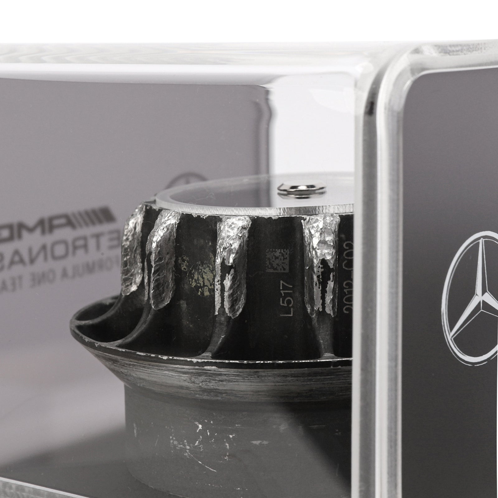 Mercedes AMG Petronas 2012 Grand Prix Used Black Wheel Nut in Display Case
