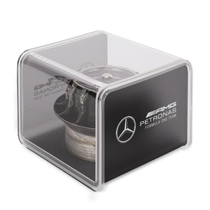 Mercedes AMG Petronas 2013 Grand Prix-used black wheel nut in display case, authentic Formula 1 engineering collectible for collector display