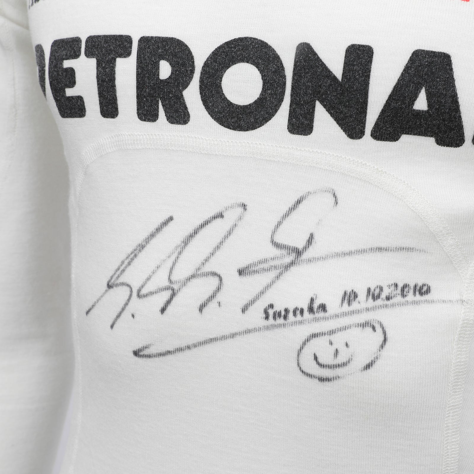 LOT 741 - Michael Schumacher 2010 Mercedes Nomex - Japan GP Used Signed