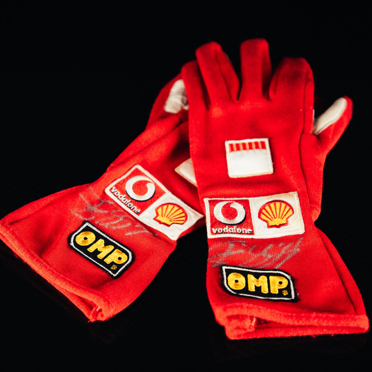 The Austin Auction LOT 045 - Michael Schumacher 2005 Scuderia Ferrari Signed OMP Racing Gloves