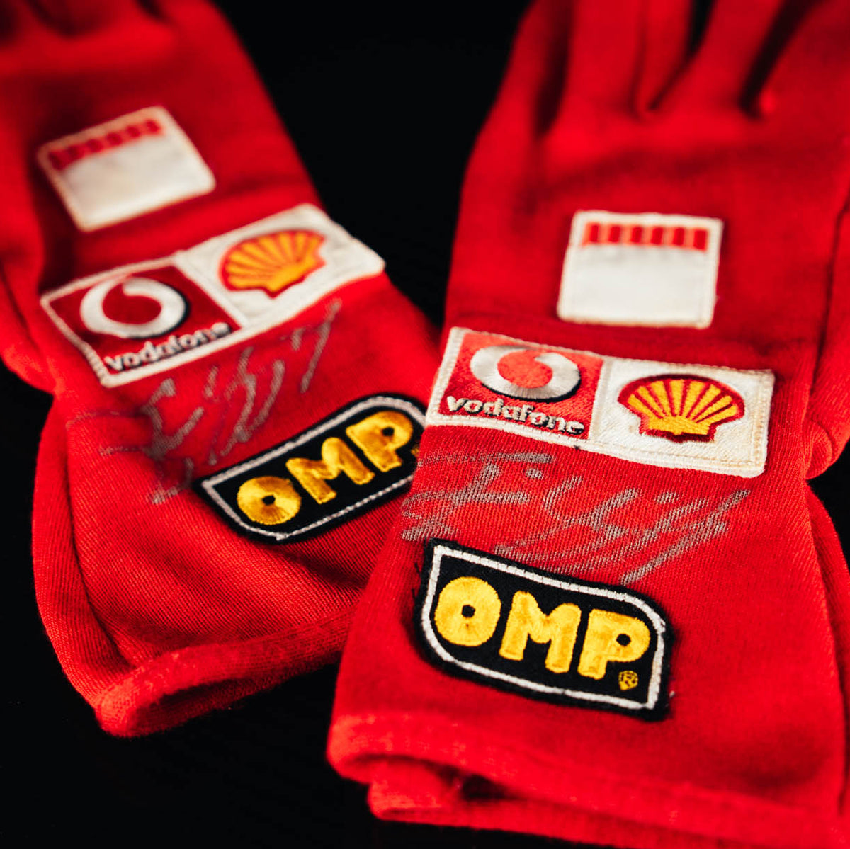 The Austin Auction LOT 045 - Michael Schumacher 2005 Scuderia Ferrari Signed OMP Racing Gloves