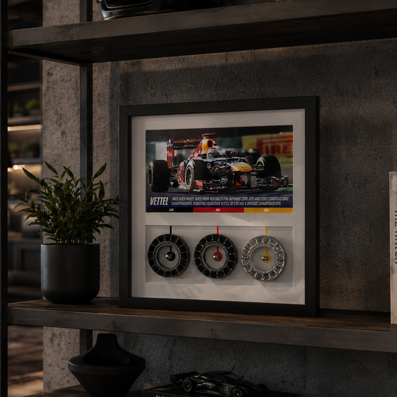 Authentic Sebastian Vettel Red Bull Racing Grand Prix-used wheel nuts in a framed collector display, premium Formula 1 engineering memorabilia