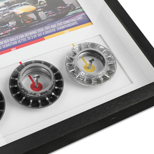 Sebastian Vettel framed Red Bull Racing Grand Prix-used wheel nuts showcasing authentic Formula 1 engineering and motorsport memorabilia