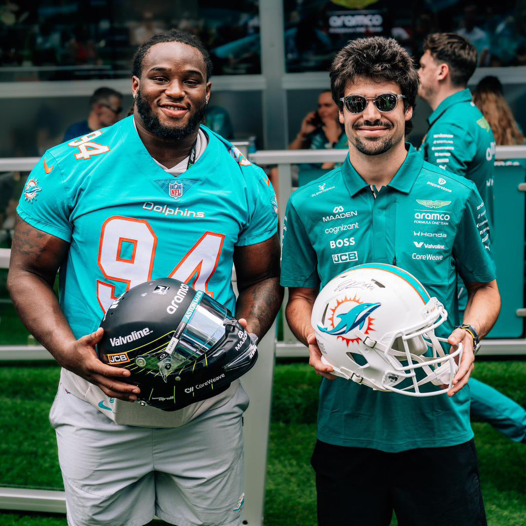 Aston Martin Aramco Formula One™ Team x Miami Dolphins - Lance Stroll Signed Helmet and Jordan Phillips Signed Football Helmet, presented by Atlas Air Worldwide