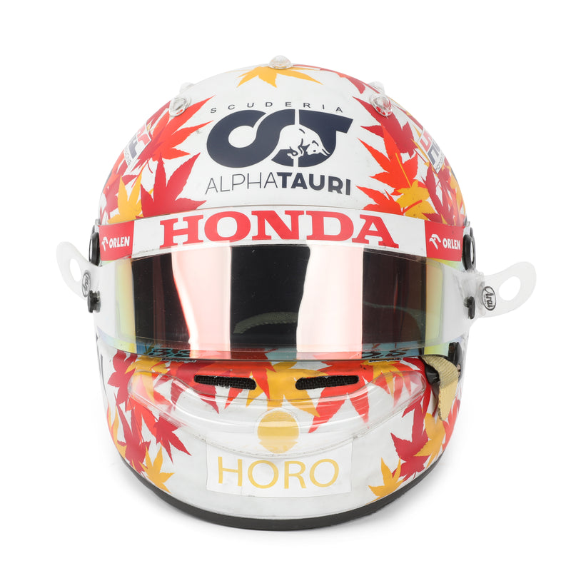 Authentic Yuki Tsunoda 2023 Bahrain Grand Prix race-worn AlphaTauri helmet, rare Formula 1 collectible and motorsport display piece