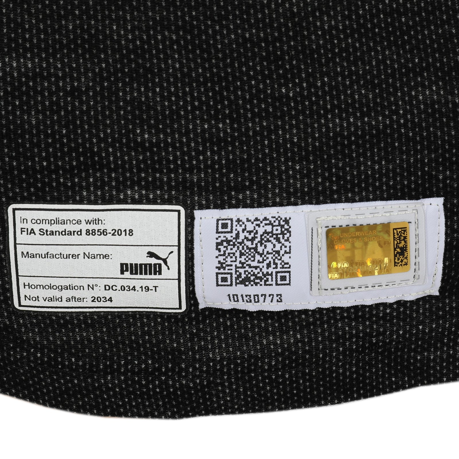 LOT 622 - Guanyu Zhou Signed 2024 Race Grand Prix Used Stake F1 Team Kick Sauber Nomex