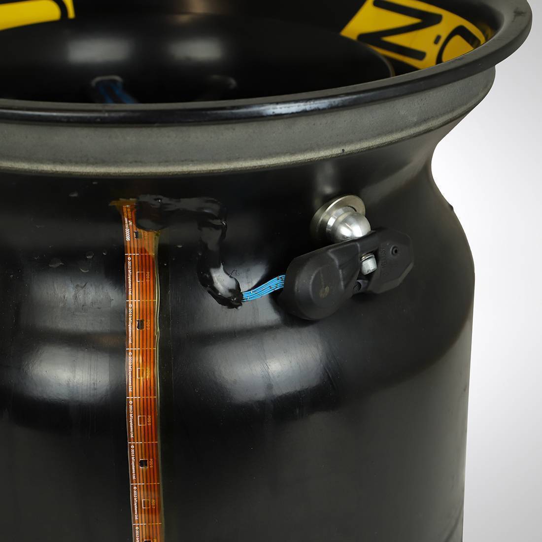 Auction LOT 032 - Renault F1® Team 2016 Front Wheel Rim Table